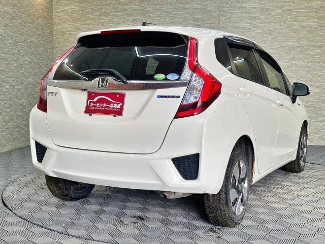 フィット1.5ハイブリッドLパッケージ 4WD 5年保証 スマキー ナビTV Bカメ 寒冷地仕様 禁煙 車検整備2年付