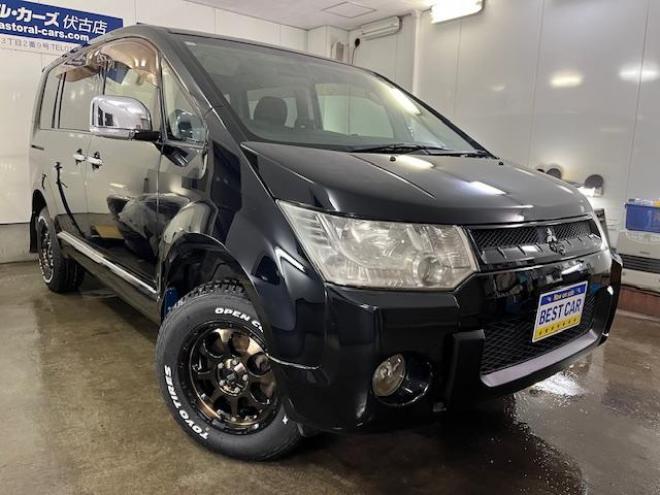 デリカＤ：５　Ｇプレミアム　本州仕入　禁煙車　寒冷地仕様　マッドクロス１６インチＡＷ＋新品ＴＯＹＯオープンカントリーホワイトレター　社外１６ＡＷ＋スタッドレスタイヤ付　新品ＪＡＯＳブラックマッドガード　両側パワースライドドア　パワーバックドア　純正ＨＤＤナビ（地デジ　ＤＶＤ再生　Ｂｌｕｅｔｏｏｔｈ）＋バックカメラ　純正リアフリップダウンモニター　クルーズコントロール　両席シートヒーター　パワーシート　スマートキー　パドルシフト　横滑り防止装置　盗難防止装置　リアヒーター　ＨＩＤ　ＥＴＣ 4WD 2400 5Dr
