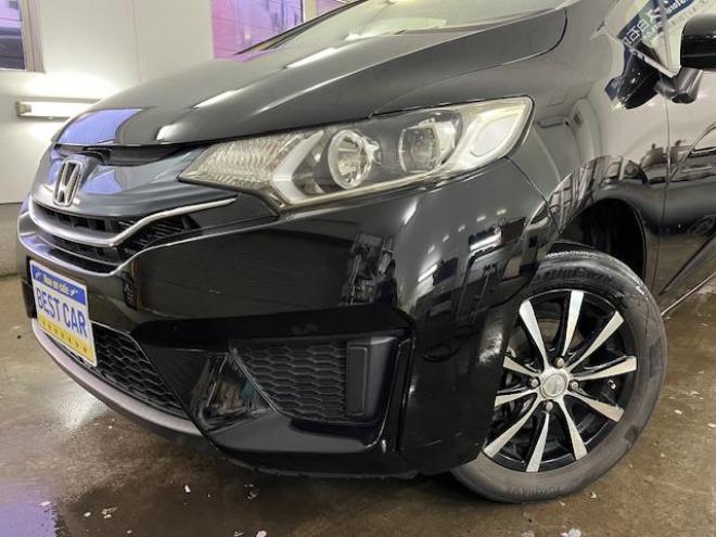 フィット１３Ｇ　Ｌパッケージ　コンフォートビューＰＫＧ　ワンオーナー　寒冷地仕様　禁煙車　ＷＡＫＯＳバリアスコーティング済　社外１５インチＡＷ　社外１５ＡＷ＋スタッドレスタイヤ付　純正ギャザースナビ（地デジ　ＤＶＤ再生　Ｂｌｕｅｔｏｏｔｈ）＋バックカメラ　純正ＬＥＤヘッドライト　ＰＵＳＨスタート　スマートキー　ミラーヒーター　フロントガラス熱線　アイドリングストップ　盗難防止装置　横滑り防止装置　ＥＴＣ 4WD 1300 5Dr
