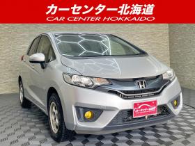 フィット　13G Fパッケージ 4WD 5年保証 スマキー ETC ナビ 寒冷地仕様 禁煙 修復歴無