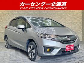フィット　1.5ハイブリッドLパッケージ 4WD 5年保証 スマキー ナビTV Bカメ 夏冬タイヤ ETC 寒冷地仕様 禁煙 修復歴無