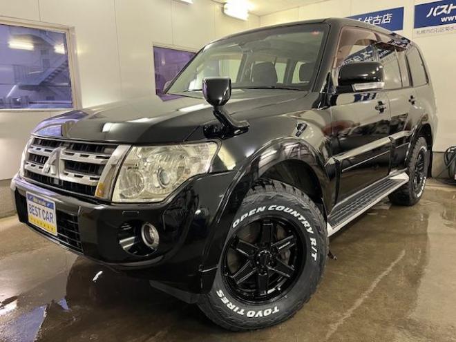 パジェロロング　エクシード　本州仕入　禁煙車　ディーゼルターボ　ＷＥＤＳキーラー１７ＡＷ＋新品ＴＯＹＯホワイトレタータイヤ　純正１７ＡＷ＋スタッドレスタイヤ付　新品ＪＡＯＳブラックマッドガード　イクリプスナビ（フルセグ地デジ　ＤＶＤ再生　Ｂｌｕｅｔｏｏｔｈ）＋バックカメラ　クルーズコントロール　両席シートヒーター　リアヒーター　横滑り防止装置　盗難防止装置　１００Ｖ電源　ＨＩＤ　ＥＴＣ 4WD 3200 5Dr