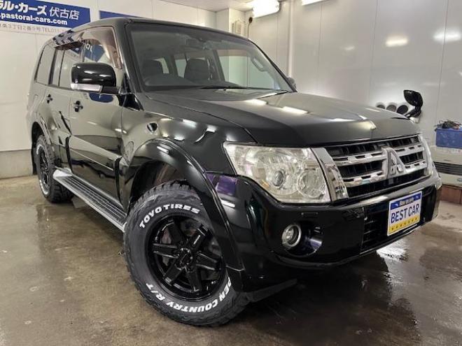 パジェロロング　エクシード　本州仕入　禁煙車　ディーゼルターボ　ＷＥＤＳキーラー１７ＡＷ＋新品ＴＯＹＯホワイトレタータイヤ　純正１７ＡＷ＋スタッドレスタイヤ付　新品ＪＡＯＳブラックマッドガード　イクリプスナビ（フルセグ地デジ　ＤＶＤ再生　Ｂｌｕｅｔｏｏｔｈ）＋バックカメラ　クルーズコントロール　両席シートヒーター　リアヒーター　横滑り防止装置　盗難防止装置　１００Ｖ電源　ＨＩＤ　ＥＴＣ 4WD 3200 5Dr