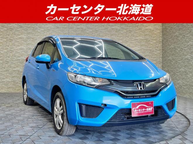 フィット1.5ハイブリッドFパッケージ 4WD 5年保証 スマキー Bカメ ETC 夏冬タイヤ 寒冷地仕様 禁煙 車検整備2年付