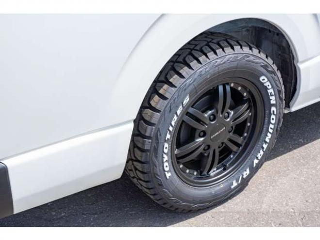ハイエースバン2.8 DX ロング ディーゼルターボ 4WD　フロントシートセパレート仕様変更済　センターコンソール付　415COBRA丸目ライトキット&バッドラッカー16インチAW　415SAFARIフロントスポイラー　TOYOオープンカントリーR/T　電動格納ドアミラー 2800