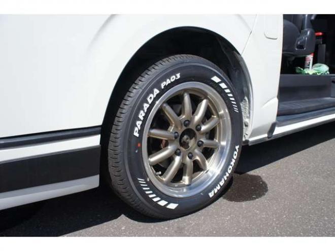 ハイエースバン2.8 DX ワイド スーパーロング ハイルーフ ディーゼルターボ 4WD　オグショー跳上2段ベッドキット 前後S-GLシート　スーリーサイドオーニング 415SAFARI Fスポイラー　ESSEX ENCB17インチAW　PARADA215/60R17　WEBASTO-FFヒーター　サブバッテリー&外部電源&走行充電 2800