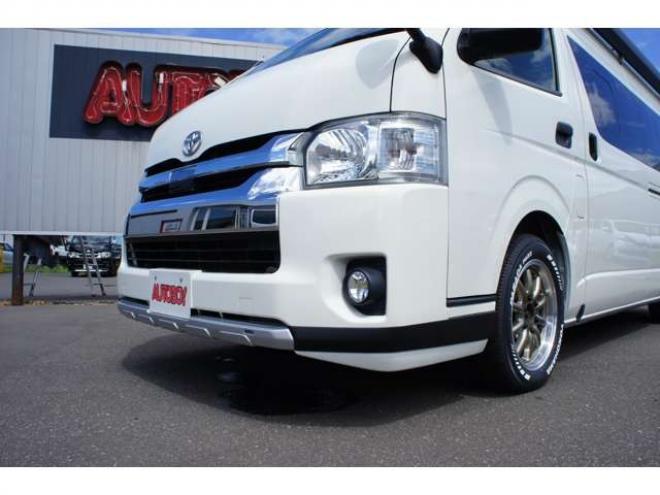 ハイエースバン2.8 DX ワイド スーパーロング ハイルーフ ディーゼルターボ 4WD　オグショー跳上2段ベッドキット 前後S-GLシート　スーリーサイドオーニング 415SAFARI Fスポイラー　ESSEX ENCB17インチAW　PARADA215/60R17　WEBASTO-FFヒーター　サブバッテリー&外部電源&走行充電 2800