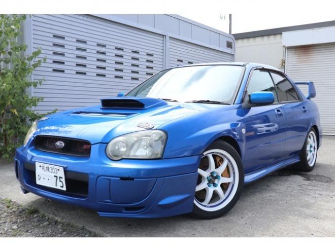 インプレッサSTI 2.0 WRX 4WD　6速マニュアル・ナビ・キーレス・社外マフラー・ローダウン・Tベル済み・R9/7月 2000