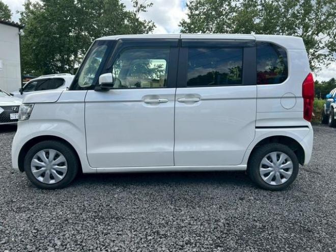 N-BOXＧ・Ｌホンダセンシング　ＥＴＣ　バックカメラ　両側スライド・片側電動　オートクルーズコントロール　レーンアシスト　衝突被害軽減システム　オートライト　スマートキー　電動格納ミラー　シートヒーター　ベンチシート　ＣＶＴ　ＥＳＣ 4WD 660 5Dr