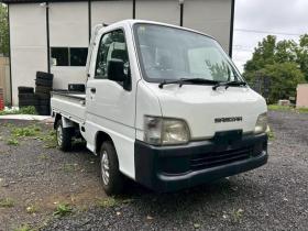 サンバー　トラック ＴＢ　４ＷＤ　ＭＴ　アルミホイール　運転席エアバッグ 4WD 660 2Dr