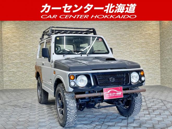 ジムニーワイルドウインド 4WD 5年保証 下廻防錆 ルーフキャリア HID 寒冷地仕様 禁煙 車検整備2年付 修復歴無