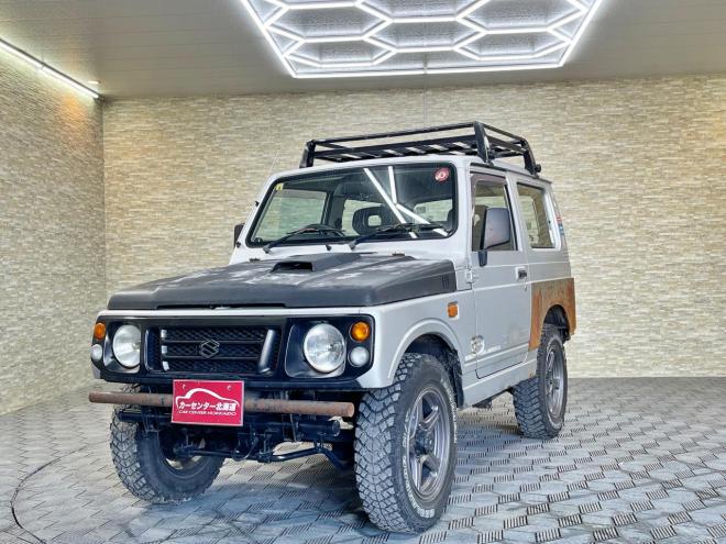 ジムニーワイルドウインド 4WD 5年保証 下廻防錆 ルーフキャリア HID 寒冷地仕様 禁煙 車検整備2年付 修復歴無