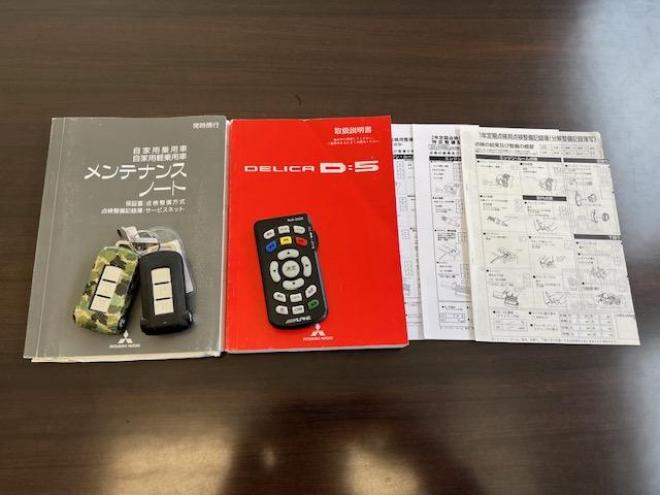 デリカＤ：５　Ｇパワーパッケージ　本州仕入　ワンオーナー　寒冷地仕様　デイトナ１６インチホイール＋ＴＯＹＯオープンカントリーホワイトレター　純正１８ＡＷ＋スタッドレスタイヤ付　新品ＪＡＯＳブラックマッドガード　両側パワースライドドア　アルパインＨＤＤナビ（フルセグ地デジ　ＤＶＤ再生　Ｂｌｕｅｔｏｏｔｈ）＋バックカメラ　アルパイン製リアフリップダウンモニター　リアスポイラー　クルーズコントロール　スマートキー　パドルシフト　横滑り防止装置　盗難防止装置　リアヒーター　ＨＩＤ　ＥＴＣ 4WD 2400 5Dr