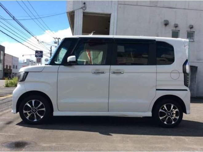N-BOXカスタム 660 G EX ホンダセンシング 4WD　パワスラ　シートヒーター　スマートキー　プッシュスタート　クルーズコントロール　ホンダ純正ナビ　バックカメラ　電動格納ミラー　横滑り防止装置　車線逸脱防止　衝突被害軽減システム　オートライト　ETC 660