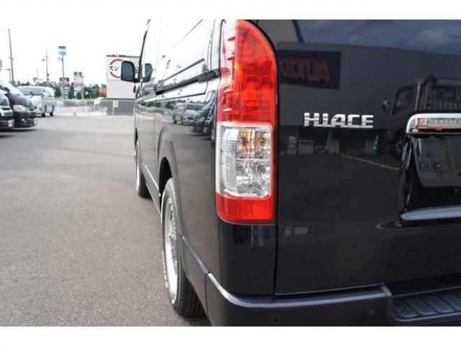 ハイエースバン2.8 スーパーGL ダークプライムII ロングボディ ディーゼルターボ 4WD　415COBRA　クリーンルック3Fスポ&BY2ボンネット&ステージ2ルーフスポ&バッドラッカーIII17インチAW&フラットベッドキット　ヨコハマPARADA17インチ　デジタルインナー　パノラマモニター　両側パワースライドドア 2800