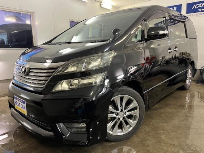 ヴェルファイア２．４Ｚ　プラチナセレクションⅡ　本州仕入　ワンオーナー　禁煙車　ＷＡＫＯＳバリアスコーティング済　純正１８インチＡＷ　純正１６ＡＷ＋スタッドレスタイヤ付　両側パワースライドドア　パワーバックドア　純正ナビ（フルセグ地デジ　ＤＶＤ再生　Ｂｌｕｅｔｏｏｔｈ）＋バックカメラ　純正リアフリップダウンモニター　コーナーセンサー　横滑り防止装置　ＨＩＤ　ＥＴＣ 　タイミングチェーン 4WD 2400 5Dr