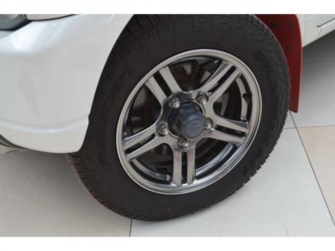 ジムニーランドベンチャー 4WD　ワンオーナー特別仕様車パートタイム4WDターボSDナビTVハーフレザーシートヒーター禁煙車マッドフラップ純正16インチアルミホイル 660