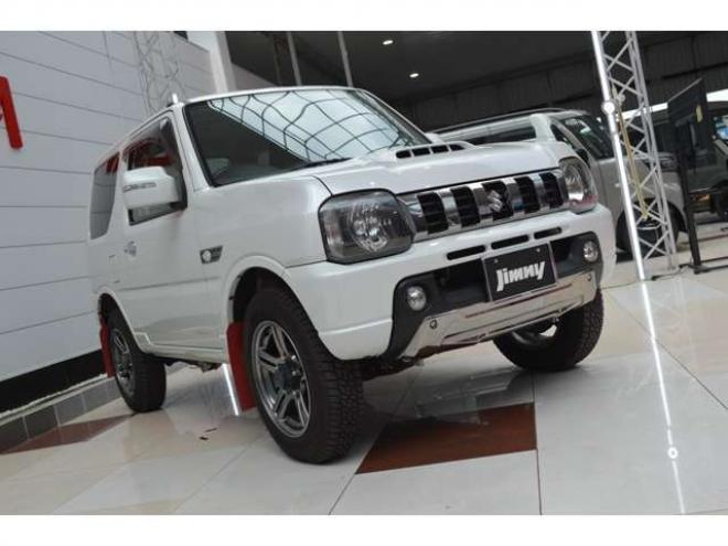 ジムニーランドベンチャー 4WD　ワンオーナー特別仕様車パートタイム4WDターボSDナビTVハーフレザーシートヒーター禁煙車マッドフラップ純正16インチアルミホイル 660