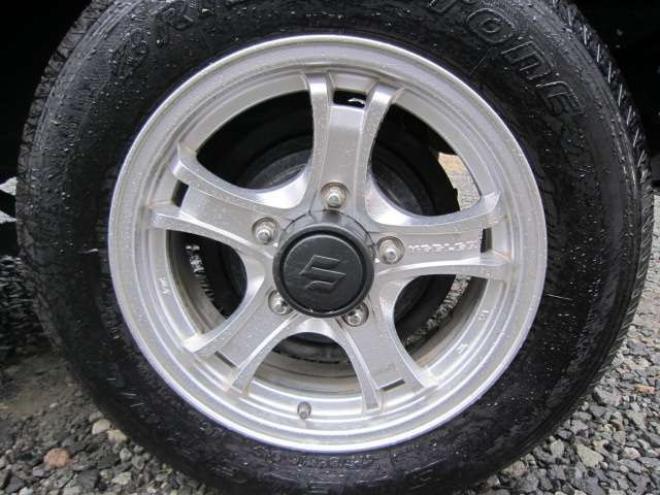 ジムニーワイルドウインド 4WD　社外アルミ ナビ&フルセグTV エンジンスターター シート&ミラーヒーター フォグ ドアバイザー ABS スタッドレス+アルミセット積込み 1年間走行無制限保証付 660