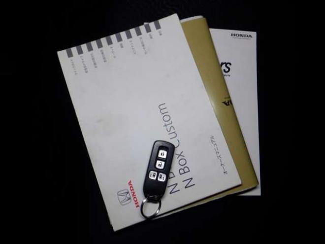 N-BOXカスタムG ターボパッケージ 4WD　ナビ・TV・B/T・両側パワスラ・ETC・HID・本州仕入・ターボ・4WD・クルコン・ステアリングスイッチ・フォグ・スマートキー・プッシュスタート 660