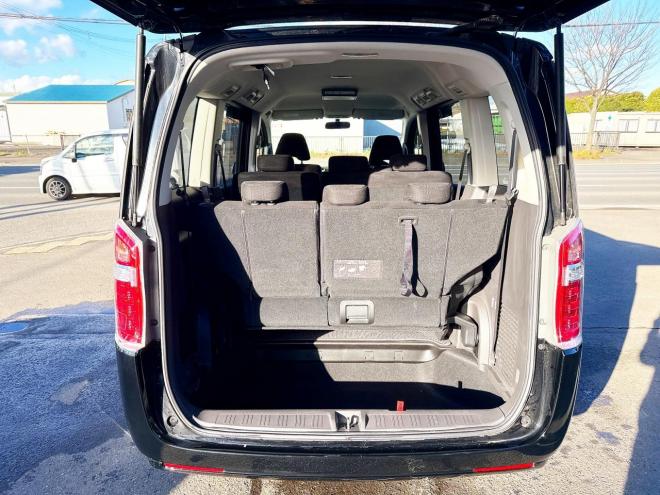 ステップワゴン2.0G Eセレクション 4WD 本州仕入　寒冷地仕様 純正ナビ　Bluetooth接続　後席モニター　パワースライド　アイドリングストップ　社外アルミ　横滑り防止　スマートキー　3列シート　タイミングチェーン車　バックカメラ　フルセグTV 4WD 2000 ５Dr