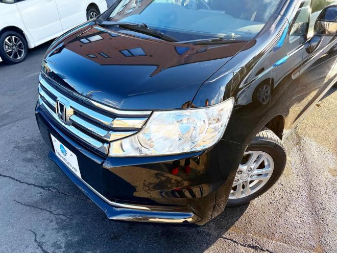 ステップワゴン2.0G Eセレクション 4WD 本州仕入　寒冷地仕様 純正ナビ　Bluetooth接続　後席モニター　パワースライド　アイドリングストップ　社外アルミ　横滑り防止　スマートキー　3列シート　タイミングチェーン車　バックカメラ　フルセグTV 4WD 2000 ５Dr