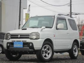 ジムニー　ワイルドウインド 4WD　社外アルミ ナビ&フルセグTV エンジンスターター シート&ミラーヒーター フォグ ドアバイザー ABS スタッドレス+アルミセット積込み 1年間走行無制限保証付 660