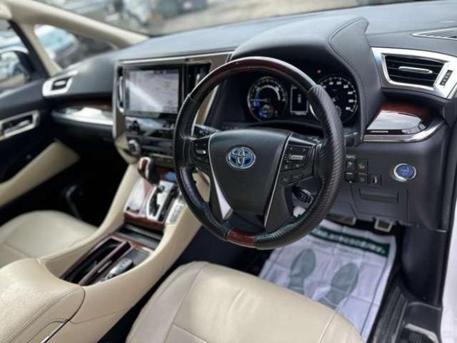 ヴェルファイアハイブリッド 2.5 V E-Four 4WD　社外アルミ　オートミラー　ETC　ドライブレコーダー　ローダウン　ワンオーナー　両側電動スライドドア　パワステ　パワーウィンドウ　ベージュ革シート　純正ナビ　バックカメラ　ABS　キーレスエントリー 2500