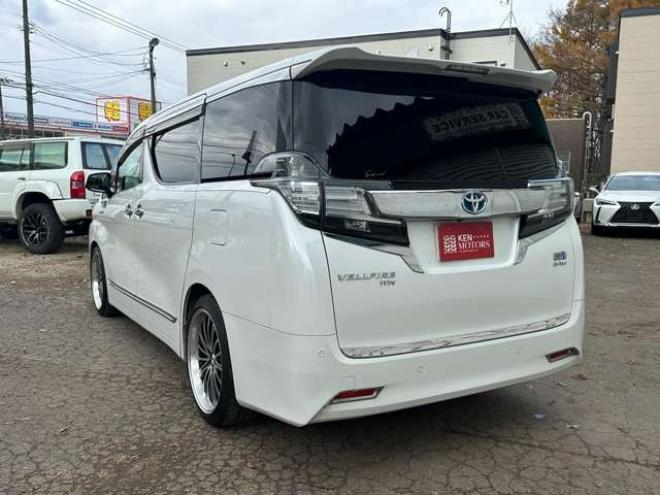 ヴェルファイアハイブリッド 2.5 V E-Four 4WD　社外アルミ　オートミラー　ETC　ドライブレコーダー　ローダウン　ワンオーナー　両側電動スライドドア　パワステ　パワーウィンドウ　ベージュ革シート　純正ナビ　バックカメラ　ABS　キーレスエントリー 2500