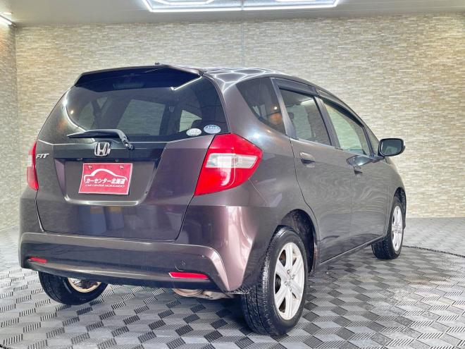 フィット1.3G 4WD 5年保証 バックカメラ 寒冷地仕様 禁煙 車検整備2年付 修復歴無