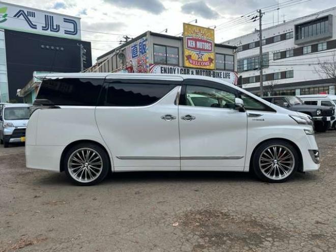 ヴェルファイアハイブリッド 2.5 V E-Four 4WD　社外アルミ　オートミラー　ETC　ドライブレコーダー　ローダウン　ワンオーナー　両側電動スライドドア　パワステ　パワーウィンドウ　ベージュ革シート　純正ナビ　バックカメラ　ABS　キーレスエントリー 2500