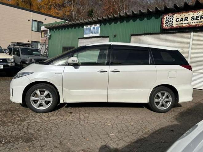 エスティマハイブリッド2.4 X 4WD　ETC　地デジ　クルーズコントロール　純正オーディオ　バックカメラ　両側スライドドア左側電動　3列シート　パワステ　パワーウィンドウ　純正アルミ　ABS　キーレスエントリー 2400