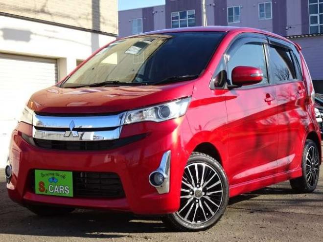 eKカスタムT セーフティパッケージ 4WD　保証1年/走行距離無制限　4WD　衝突軽減ブレーキシステム　純正ナビ　地デジ　バックカメラ　社外エンジンスターター　シートヒーター　社外15インチアルミ　純正HID　ウインカーミラー　横滑り防止　寒冷地仕様 660