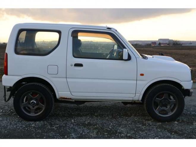 ジムニーXG 4WD　検2年　社外バンパー　社外マフラー　社外ナビ　キーレス　自社　ローンカノウ 660