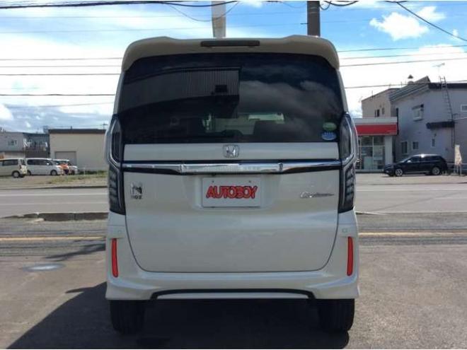 N-BOXカスタム 660 G EX ホンダセンシング 4WD　パワスラ　シートヒーター　スマートキー　プッシュスタート　クルーズコントロール　ホンダ純正ナビ　バックカメラ　電動格納ミラー　横滑り防止装置　車線逸脱防止　衝突被害軽減システム　オートライト　ETC 660