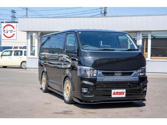 レジアスエース2.8 スーパーGL ダークプライム ロングボディ ディーゼルターボ 4WD　415COBRAコンプリート車両　ファントムヘッドライトシステム&ファントムゴールド18インチホイール&フェイスリフトキット&フルエアロ&フローティングリップ&ローフォルムフェンダー　玄武2インチダウンブロック 2800