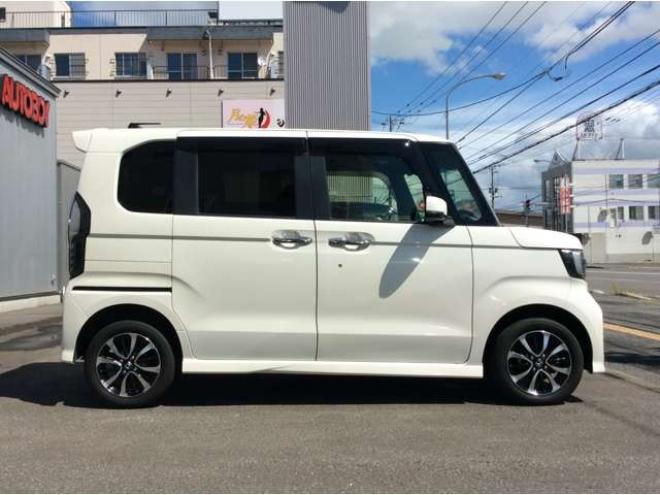 N-BOXカスタム 660 G EX ホンダセンシング 4WD　パワスラ　シートヒーター　スマートキー　プッシュスタート　クルーズコントロール　ホンダ純正ナビ　バックカメラ　電動格納ミラー　横滑り防止装置　車線逸脱防止　衝突被害軽減システム　オートライト　ETC 660