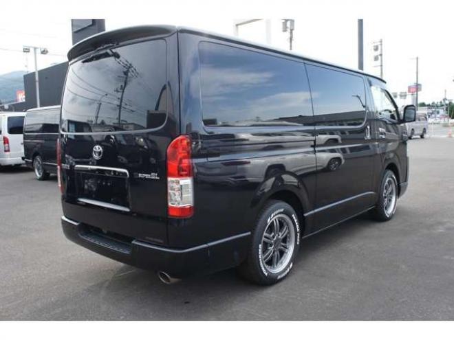 ハイエースバン2.8 スーパーGL ダークプライムII ロングボディ ディーゼルターボ 4WD　415COBRA　クリーンルック3Fスポ&BY2ボンネット&ステージ2ルーフスポ&バッドラッカーIII17インチAW&フラットベッドキット　ヨコハマPARADA17インチ　デジタルインナー　パノラマモニター　両側パワースライドドア 2800