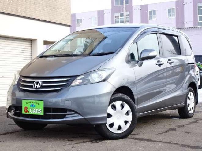 フリード1.5 G ジャストセレクション 4WD　本州車　4WD　パワースライドドア　純正HDDインターナビ　バックカメラ　TV　ビルトインETC　コンフォートパッケージ　HID　ミラーヒーター　デアイサー　車検新規2年 1500