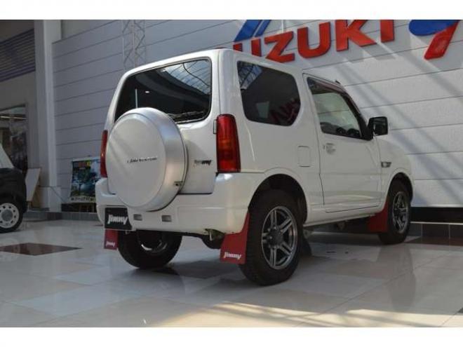 ジムニーランドベンチャー 4WD　ワンオーナー特別仕様車パートタイム4WDターボSDナビTVハーフレザーシートヒーター禁煙車マッドフラップ純正16インチアルミホイル 660