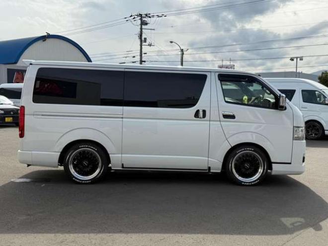 ハイエースバン2.8ダークプライムIIマルチロールトランスポータータイプIロングディーゼルターボ4WD　寒冷地仕様　ワンオーナー　ESSEX　ENCM18インチAW　ESSEXフロントリップスポイラー　ローダウン　パワースライドドア　LEDテール　415COBRAシートカバー&ローフォルムフェンダー&ステアリング 2800