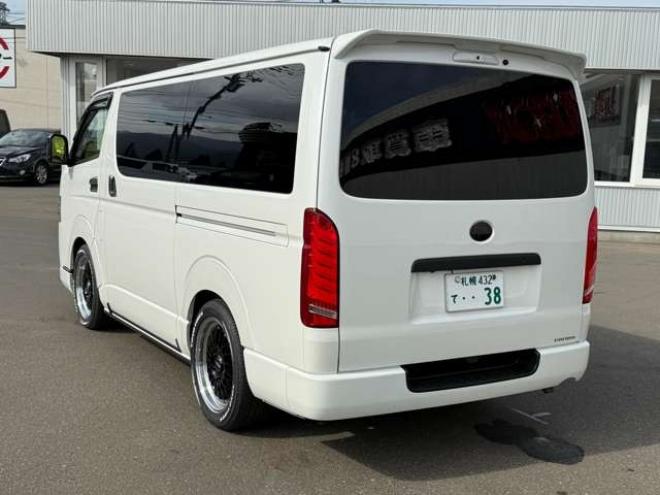 ハイエースバン2.8ダークプライムIIマルチロールトランスポータータイプIロングディーゼルターボ4WD　寒冷地仕様　ワンオーナー　ESSEX　ENCM18インチAW　ESSEXフロントリップスポイラー　ローダウン　パワースライドドア　LEDテール　415COBRAシートカバー&ローフォルムフェンダー&ステアリング 2800