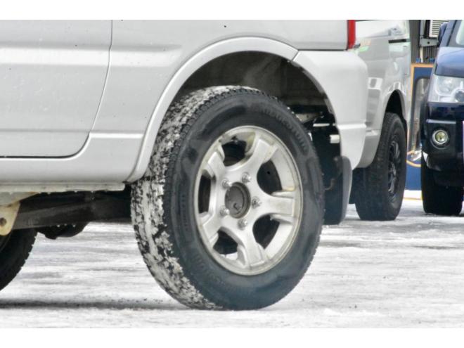 ジムニーXG　４ＷＤ　本州仕入　５ＭＴ　ブリジストンスタッドレス　社外ナビ　ＥＴＣ