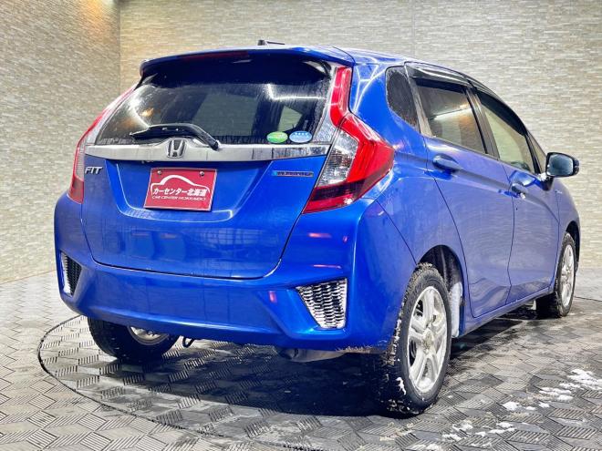 フィット1.5ハイブリッドLパッケージ 4WD 5年保証 スマキー ナビTV Bカメ 夏冬タイヤ ETC 寒冷地仕様 禁煙 車検整備2年付 修復歴無