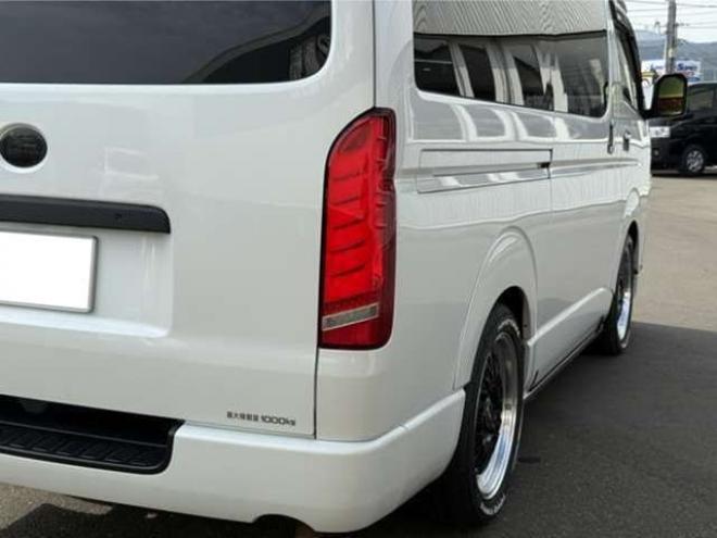 ハイエースバン2.8ダークプライムIIマルチロールトランスポータータイプIロングディーゼルターボ4WD　寒冷地仕様　ワンオーナー　ESSEX　ENCM18インチAW　ESSEXフロントリップスポイラー　ローダウン　パワースライドドア　LEDテール　415COBRAシートカバー&ローフォルムフェンダー&ステアリング 2800