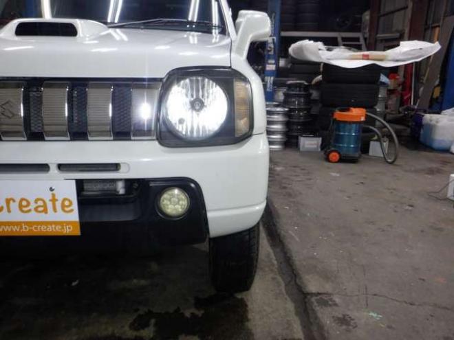 ジムニーワイルドウインド 4WD　本州仕入・ナビ・TV・Bカメラ・専用レザーシート・ETC・キーレス・シートヒーター・フォグランプ・ターボ・純正AW・電動格納ミラー・ミラーヒーター・ルーフレール 660