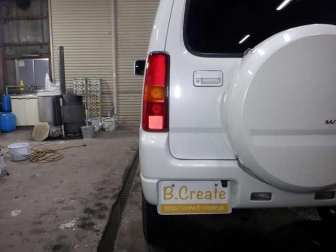 ジムニーワイルドウインド 4WD　本州仕入・ナビ・TV・Bカメラ・専用レザーシート・ETC・キーレス・シートヒーター・フォグランプ・ターボ・純正AW・電動格納ミラー・ミラーヒーター・ルーフレール 660