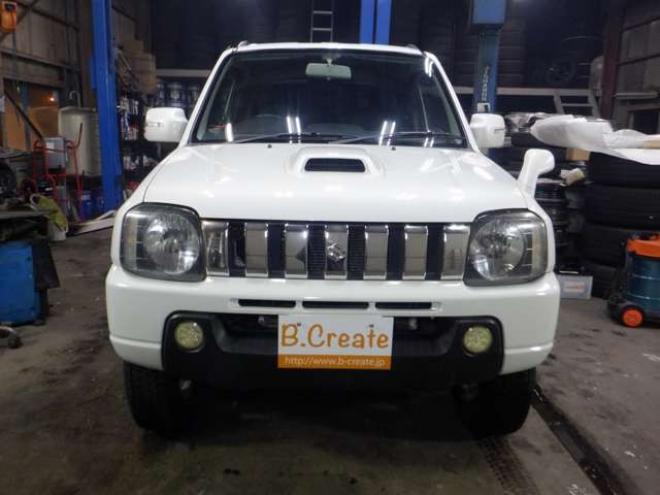 ジムニーワイルドウインド 4WD　本州仕入・ナビ・TV・Bカメラ・専用レザーシート・ETC・キーレス・シートヒーター・フォグランプ・ターボ・純正AW・電動格納ミラー・ミラーヒーター・ルーフレール 660