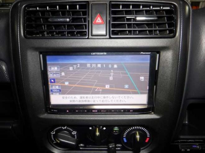 ジムニーワイルドウインド 4WD　本州仕入・ナビ・TV・Bカメラ・専用レザーシート・ETC・キーレス・シートヒーター・フォグランプ・ターボ・純正AW・電動格納ミラー・ミラーヒーター・ルーフレール 660