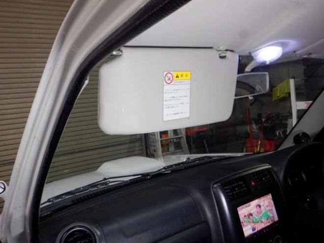 ジムニーワイルドウインド 4WD　本州仕入・ナビ・TV・Bカメラ・専用レザーシート・ETC・キーレス・シートヒーター・フォグランプ・ターボ・純正AW・電動格納ミラー・ミラーヒーター・ルーフレール 660